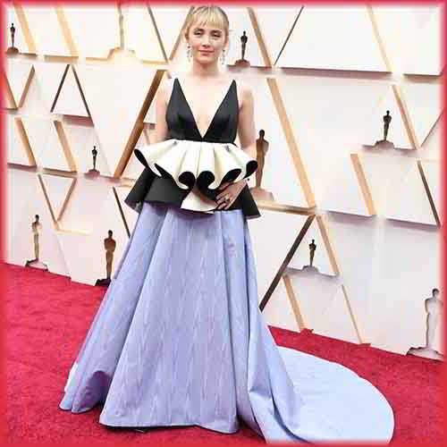 Natalia Portman walks the red carpet in an iconic dress